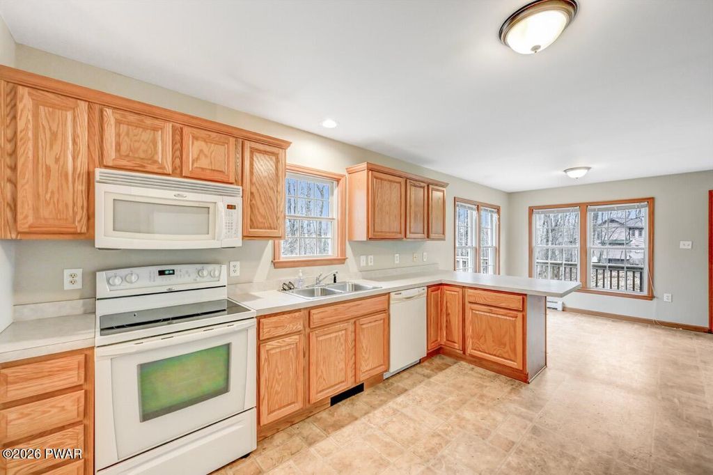 Photo of 46 Beechwood Drive, Lake Ariel, PA 18436 (MLS # PW260676)