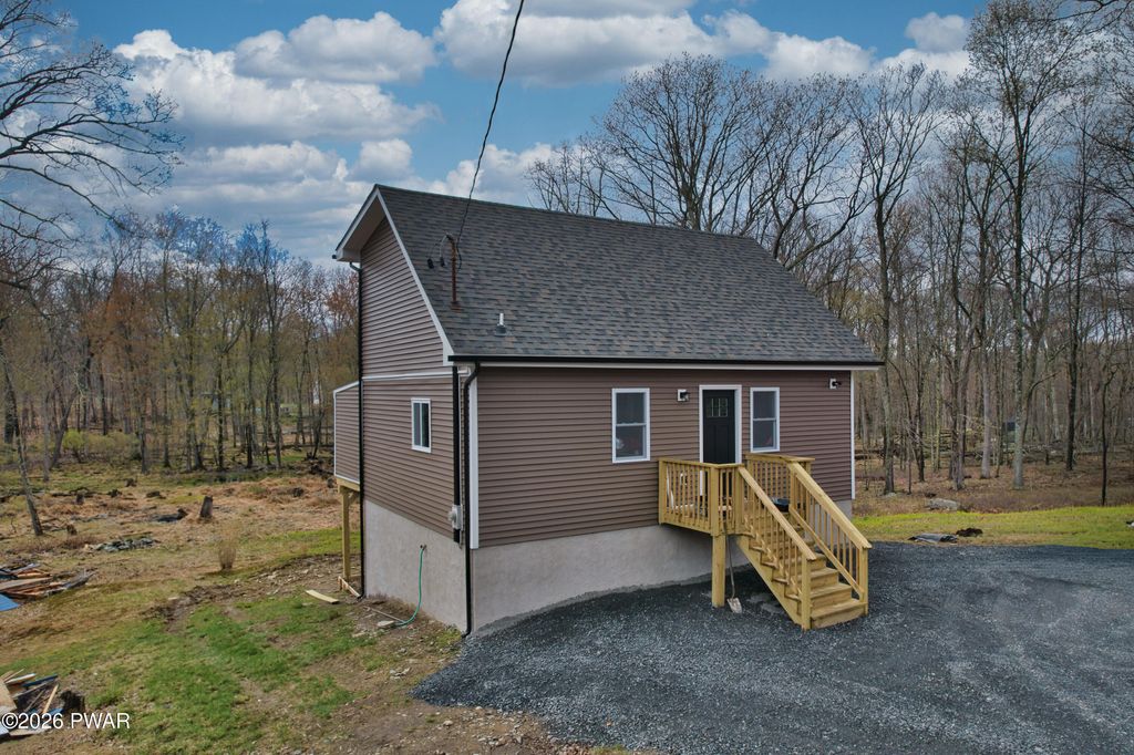 Photo of 161 Ledgeway Drive, Dingmans Ferry, PA 18328 (MLS # PW261052)