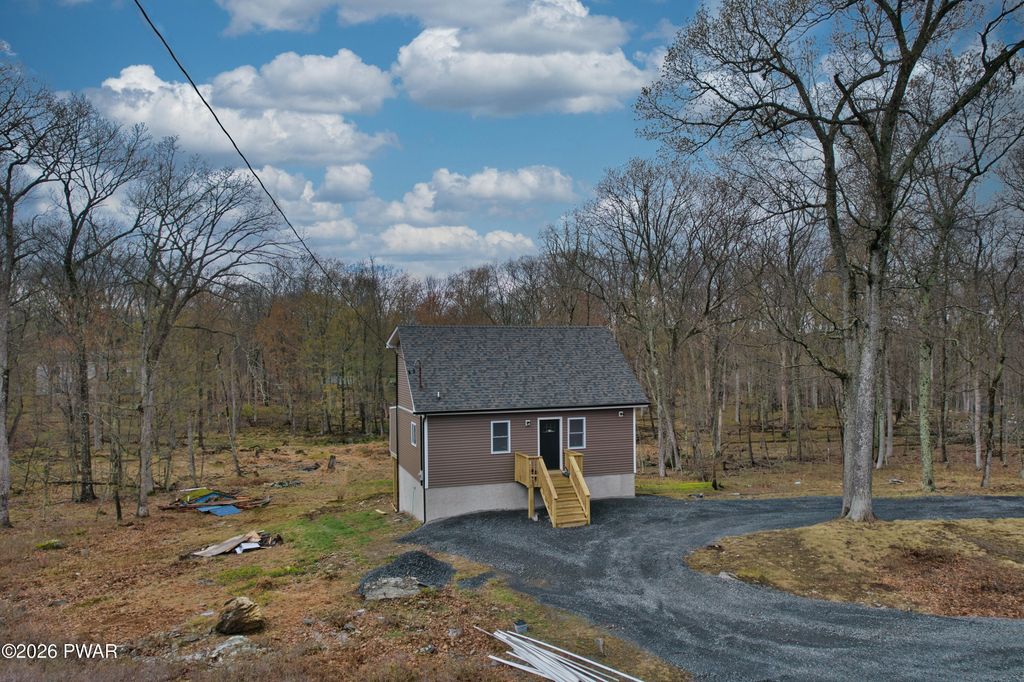 Photo of 161 Ledgeway Drive, Dingmans Ferry, PA 18328 (MLS # PW261052)