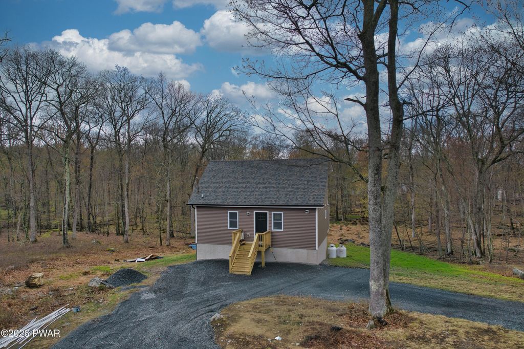 Photo of 161 Ledgeway Drive, Dingmans Ferry, PA 18328 (MLS # PW261052)