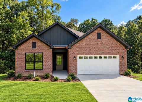 Photo of 409 Alabama Boulevard, TRUSSVILLE, AL 35173 (MLS # 21439028)