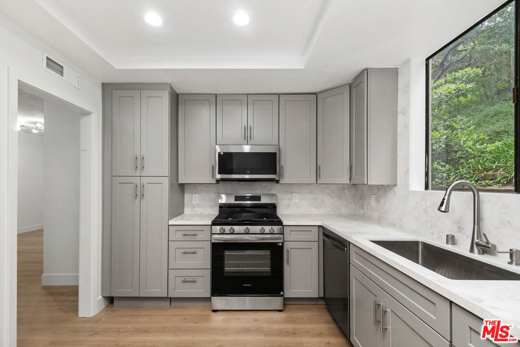 Properties 4 3480 Barham Boulevard 105