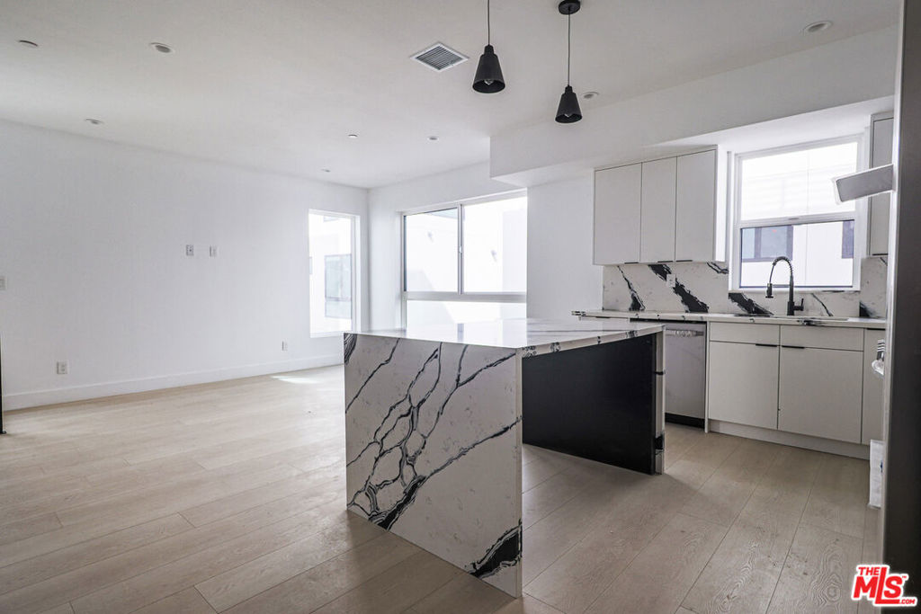 Properties 3 11810 W Gilmore Street