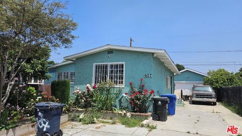 Single Family Residence in Los Angeles CA 907 104th Street.jpg