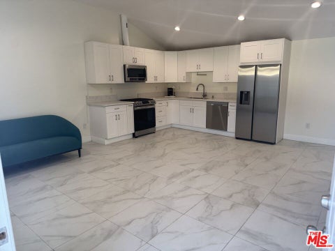Photo of 1913 Hillsboro Avenue, Los Angeles, CA 90035 (MLS # 26851997)