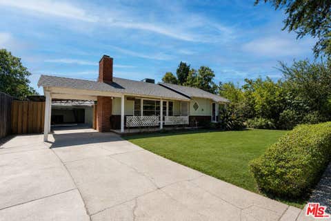 Photo of 7535 Etiwanda Avenue, Los Angeles, CA 91335 (MLS # 26864265)