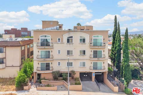 Photo of 971 S St Andrews Place #301, Los Angeles, CA 90019 (MLS # 26855691)