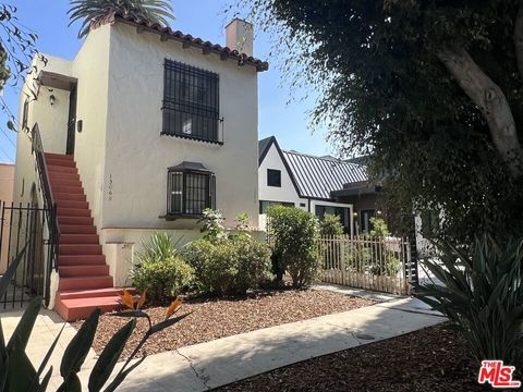 Photo of 1306 1/2 S Mansfield Avenue, Los Angeles, CA 90019 (MLS # 25601213)