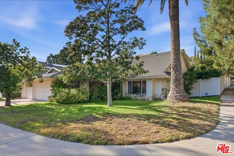 Photo of 19041 Muirkirk Drive, Porter Ranch, CA 91326 (MLS # 26843911)