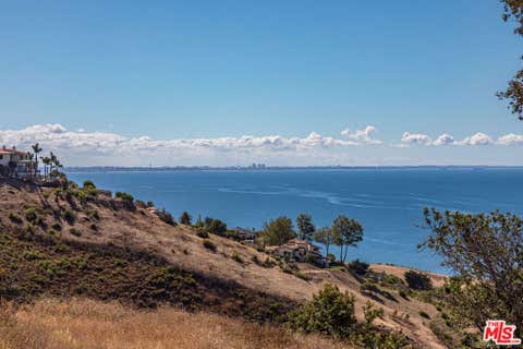 Photo of 22077 Carbon Mesa Road RD, Malibu, CA 90265 (MLS # 26843219)