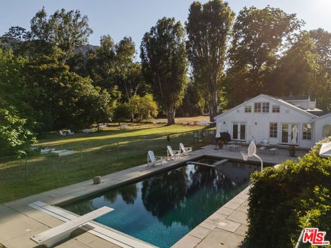 Photo of 1520 Bonnell Drive, Topanga, CA 90290 (MLS # 26855521)
