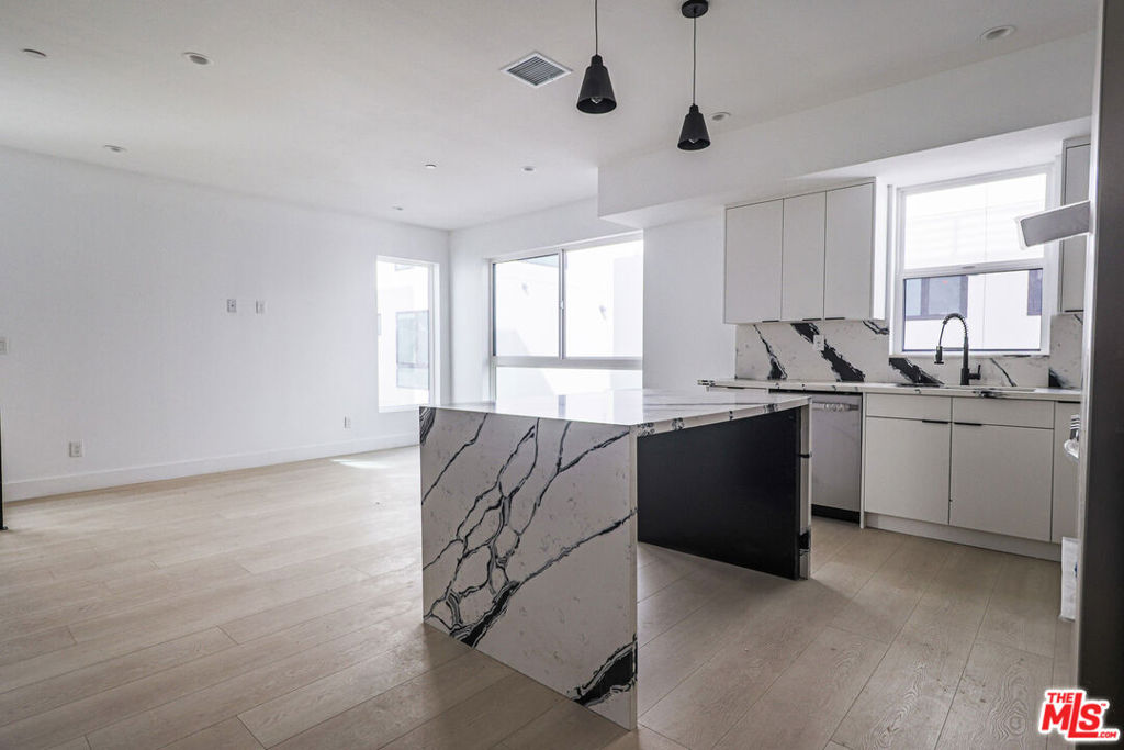Properties 3 11810 W Gilmore Street