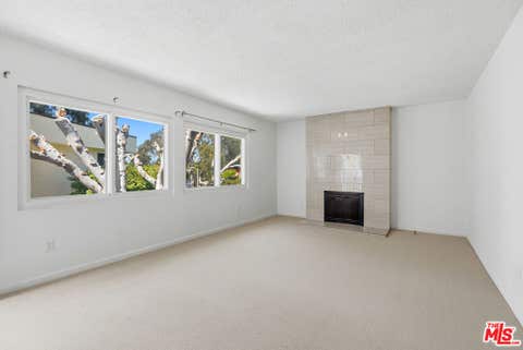 Photo of 8401 Tuscany Avenue #4, Los Angeles, CA 90293 (MLS # 26863033)