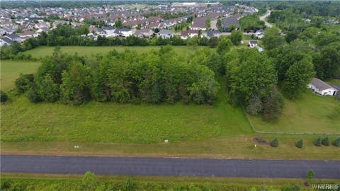 Photo of 455 Pleasant View Drive, Lancaster, NY 14086 (MLS # B1706718)