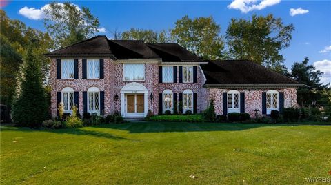 Photo of 180 Crestwood Lane, Amherst, NY 14221 (MLS # B1641910)