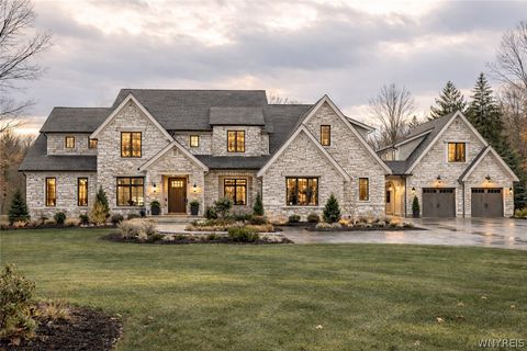 Photo of 8607 Woodside Drive, Clarence, NY 14031 (MLS # B1667908)