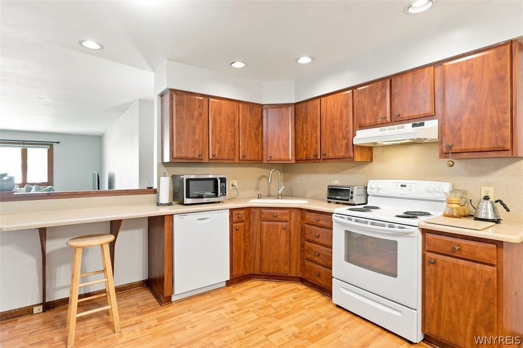 Photo of 5861 Goodrich Road #11B, Clarence, NY 14032 (MLS # B1709856)