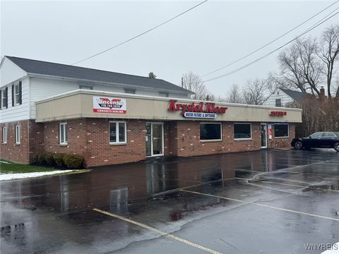 Photo of 8828 Main Street, Clarence, NY 14221 (MLS # B1657195)