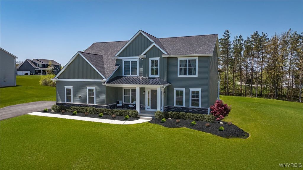 Photo of 71 Woodthrush Trail, Orchard Park, NY 14127 (MLS # B1652463)