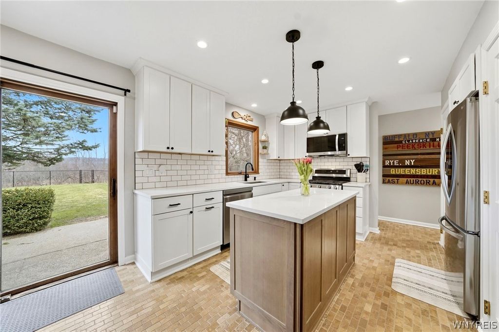 Photo of 9165 Greiner Road, Clarence, NY 14031 (MLS # B1667513)