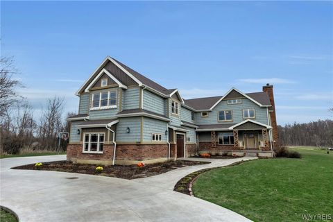 Photo of 5747 Strickler Road, Clarence, NY 14031 (MLS # B1668556)