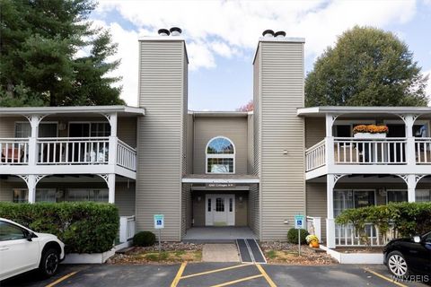 Photo of 1240 Youngs Road #C, Amherst, NY 14221 (MLS # B1646122)