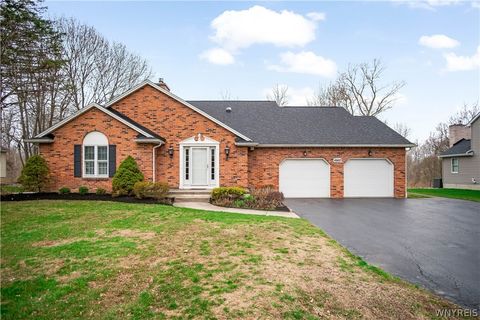 Photo of 4660 Oakwood Lane, Clarence, NY 14031 (MLS # B1673376)