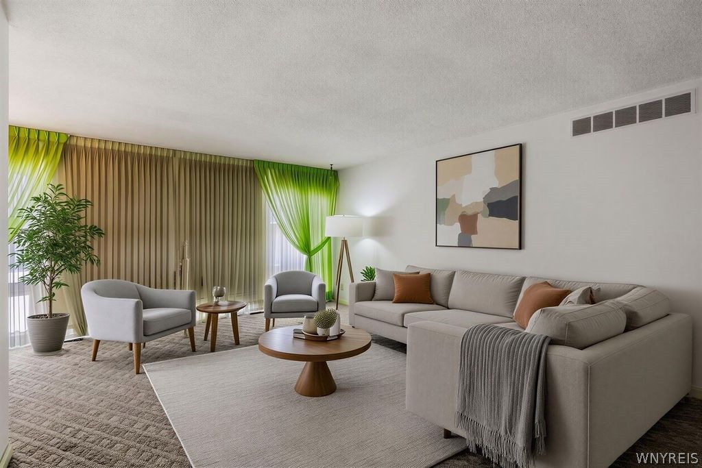 Photo of 569 Woodstock Avenue, Tonawanda, NY 14150 (MLS # B1663955)