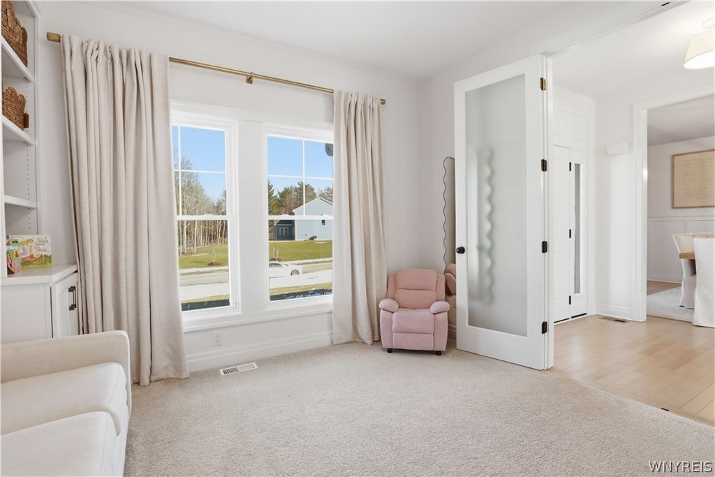 Photo of 14 Blue Heron Drive, Orchard Park, NY 14127 (MLS # B1664997)