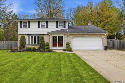 Photo of 228 Countryside Lane, Amherst, NY 14221 (MLS # B1680970)