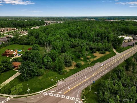 Photo of 3400 Millersport Highway, Amherst, NY 14068 (MLS # B1620420)