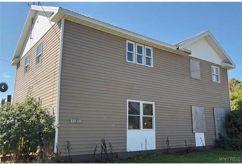 Photo of 3585 Roszyk Hill Road, Machias, NY 14101 (MLS # B1655434)