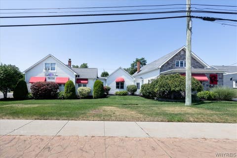 Photo of 7158 Transit Rd Road, Amherst, NY 14211 (MLS # B1701469)