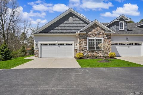 Photo of 9423 Heritage Path Path #D, Clarence, NY 14032 (MLS # B1676798)