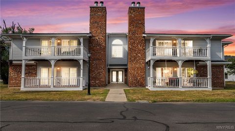 Photo of 1175 Youngs Road #E, Amherst, NY 14221 (MLS # B1632668)