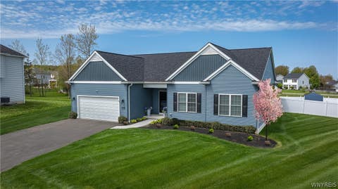 Photo of 5617 Cannon Drive, Clarence, NY 14032 (MLS # B1698656)