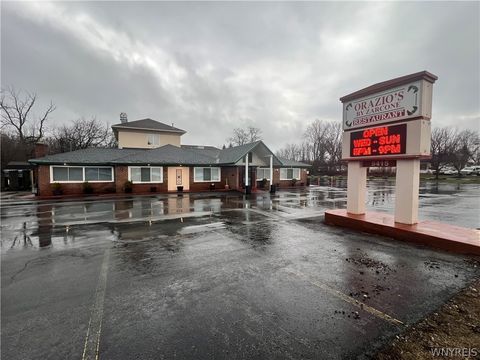 Photo of 9415 Main Street, Clarence, NY 14031 (MLS # B1670664)