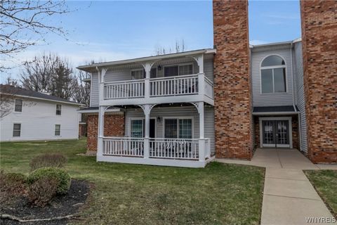 Photo of 1095 Youngs Road #C, Amherst, NY 14221 (MLS # B1669386)