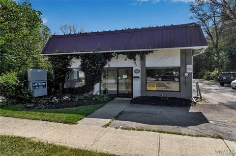 Photo of 10589 Main Street, Clarence, NY 14031 (MLS # B1658537)