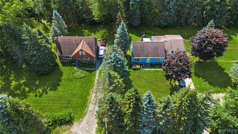Photo of 3841 E Robinson Road, Amherst, NY 14228 (MLS # B1706609)