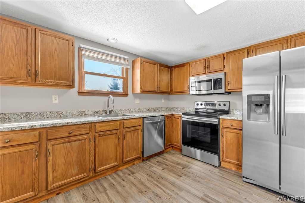 Photo of 71 Downing Street, Buffalo, NY 14220 (MLS # B1701447)