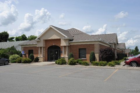 Photo of 9276 Main Street, Clarence, NY 14031 (MLS # B1635210)