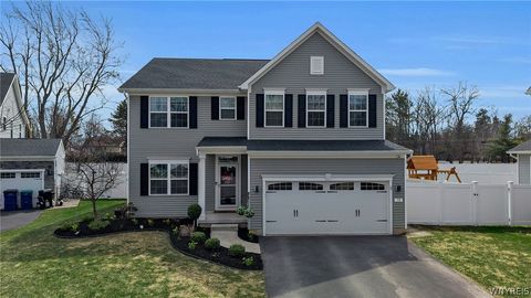 Photo of 73 Stonebridge Drive, Amherst, NY 14051 (MLS # B1670138)