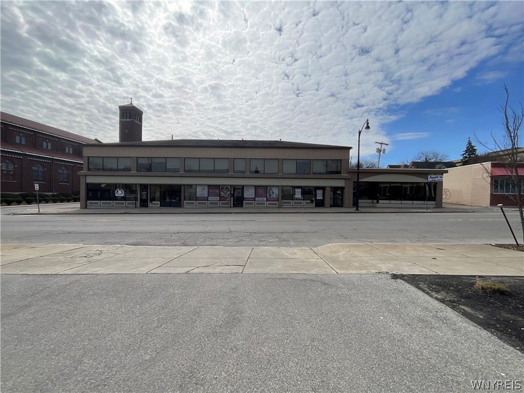 Photo of 1319 Pine Avenue, Niagara Falls, NY 14301 (MLS # B1669224)