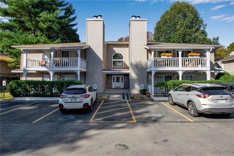 Photo of 1240 Youngs Road #H, Amherst, NY 14221 (MLS # B1642946)