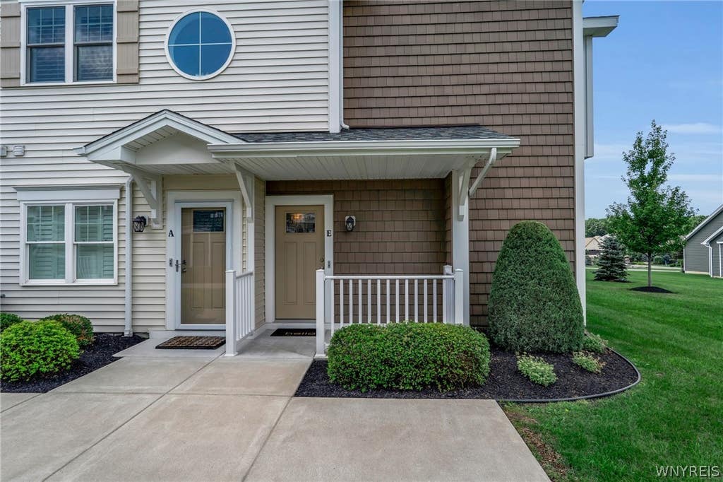 Photo of 293 Northill Drive E #E, Amherst, NY 14221 (MLS # B1709326)