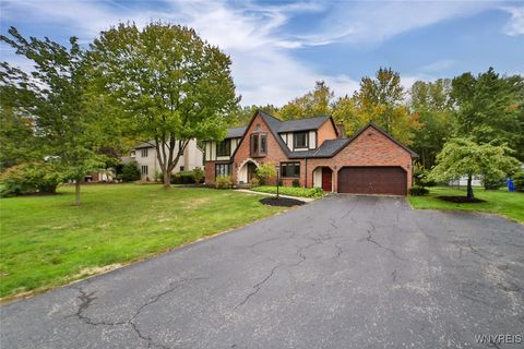 Photo of 8205 Clarherst Drive, Clarence, NY 14051 (MLS # B1640077)
