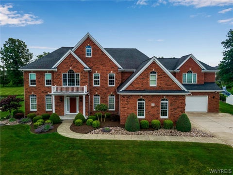 Photo of 105 Promenade Lane, Amherst, NY 14221 (MLS # B1684205)