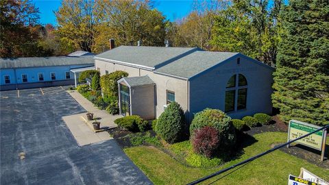 Photo of 8700 Goodrich Road, Clarence, NY 14032 (MLS # B1628533)