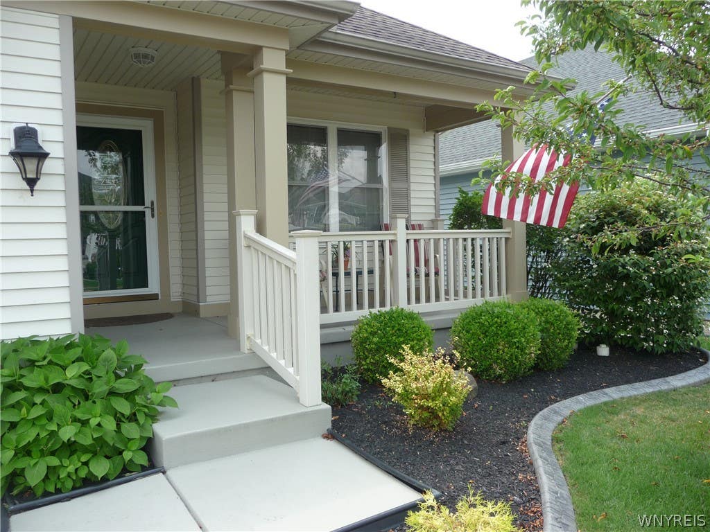 Photo of 129 Blossom Wood Lane, Cheektowaga, NY 14227 (MLS # B1703847)
